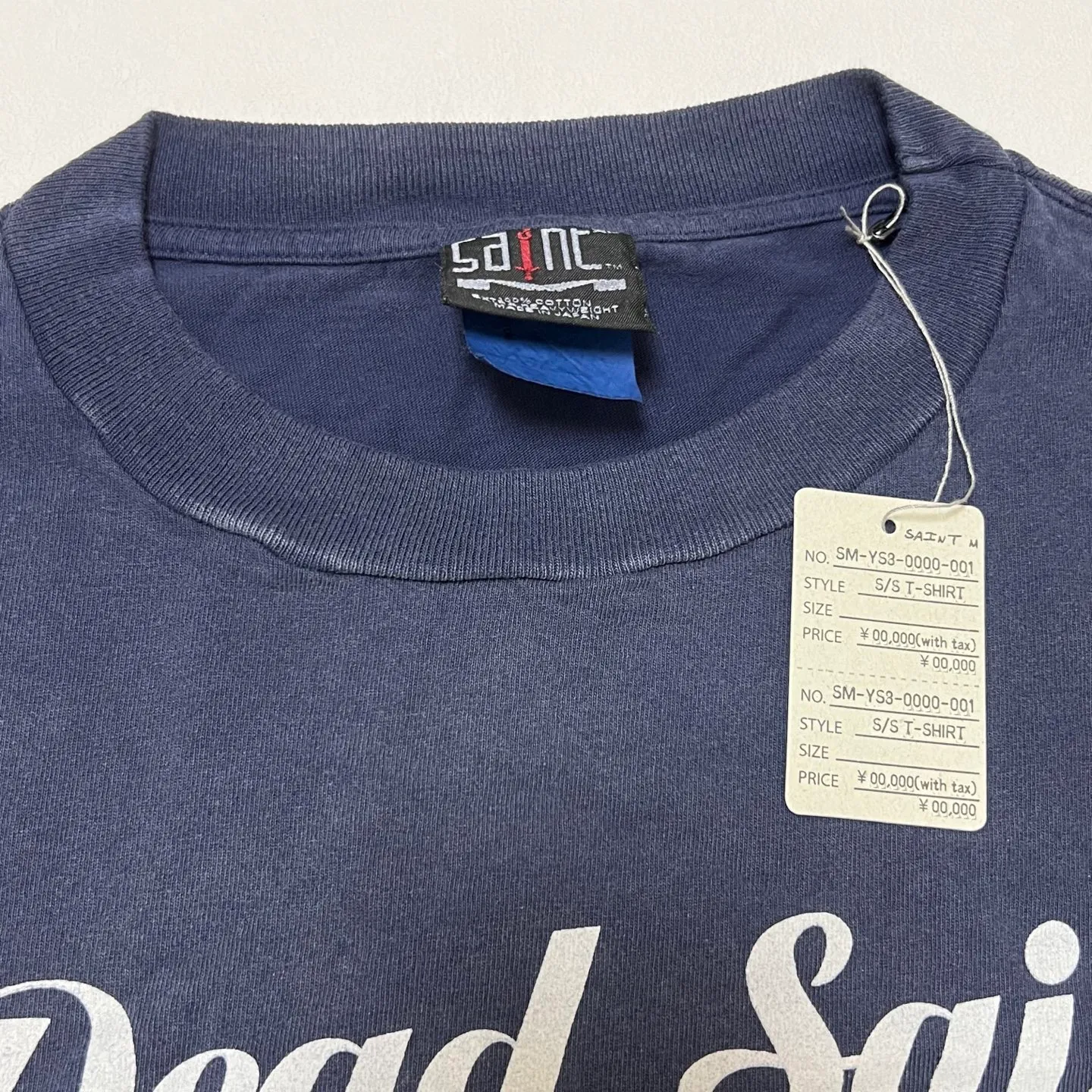 SAINT Mxxxxxx DEAD SAINT SS TEE/NAVY DEAD SAINT printed short sleeves God's Punishment TEE Washed blue S-XL Genuine consistent tube weaving without side seams High weight OE yarn fabric Assute dyeing Multiple horse fades Heavy wash water Worn holes Original consistent main mark/wash mark/little angel anti-counterfeiting mark